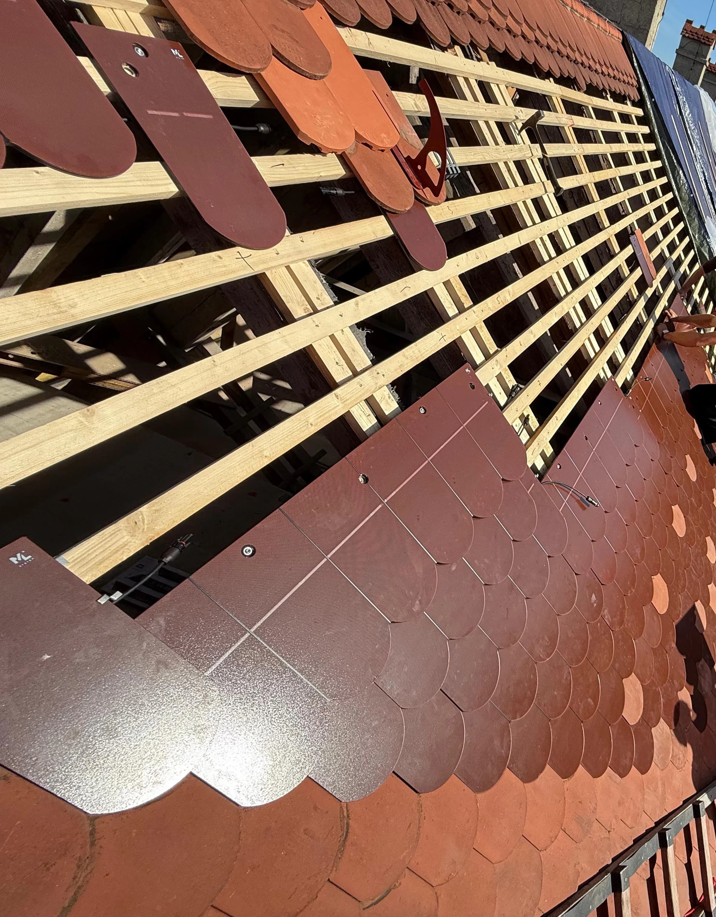 Angled close-up of a roof mid-renovation